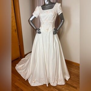 Alfred Angelo Ivory Wedding Gown with Blush Embroidery and cathedral train.